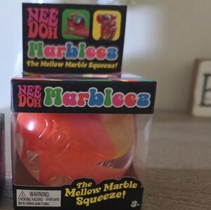 NeeDoh Marbleez Mellow Marble Squeezer - Pink/yellow/orange